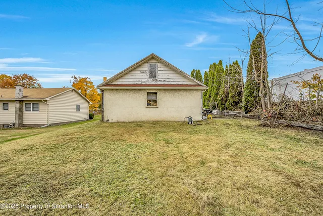 a house view with a garden space