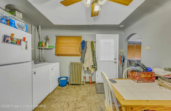 a bedroom with furniture a bed and a window