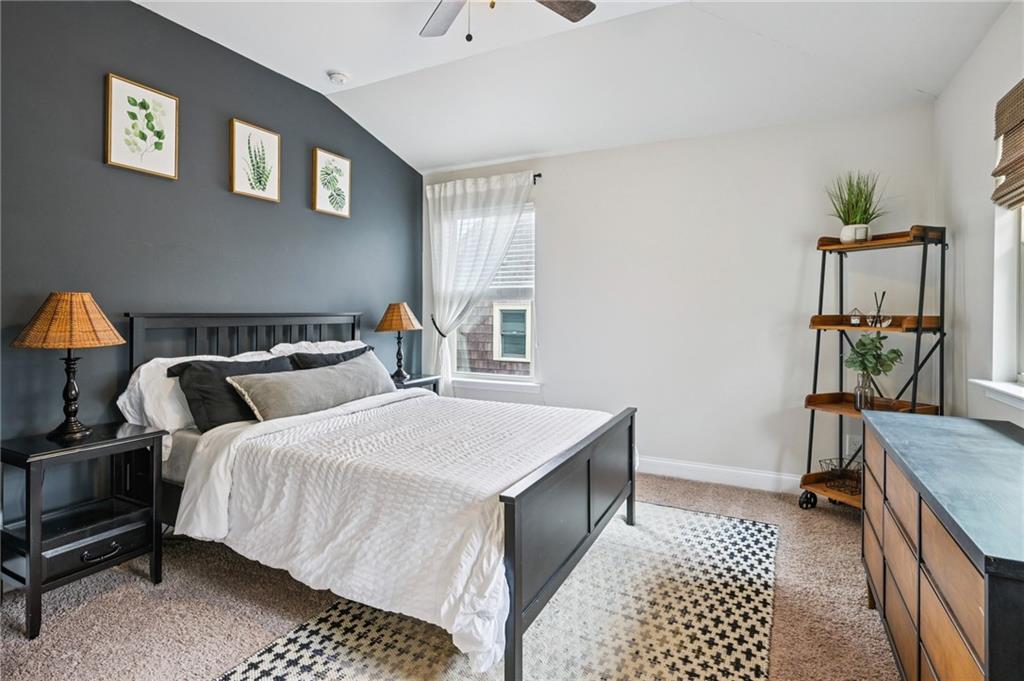 2358 Boulder Road Southeast Atlanta, GA 30316 - Photo 21 of 28 a bedroom with a bed and wooden floor