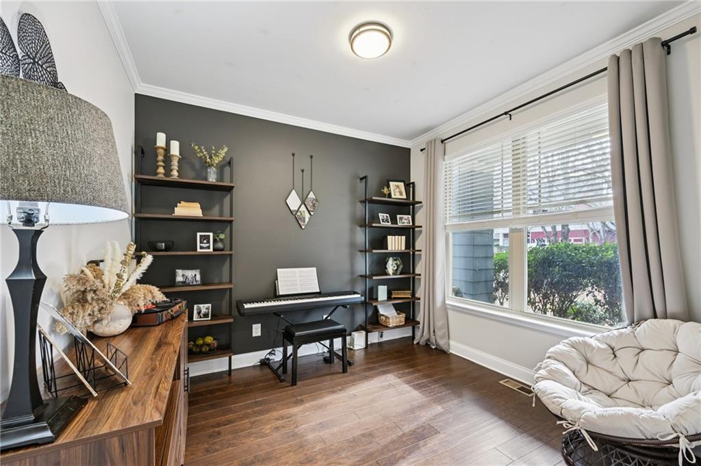 2358 Boulder Road Southeast Atlanta, GA 30316 - Photo 5 of 28 a living room with furniture and wooden floor