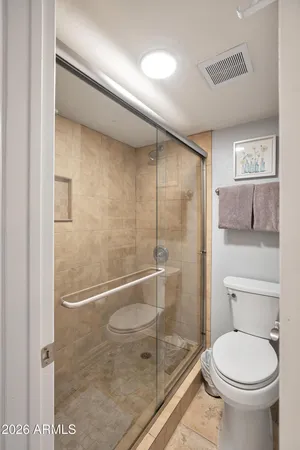 a kitchen with a stove and a microwave