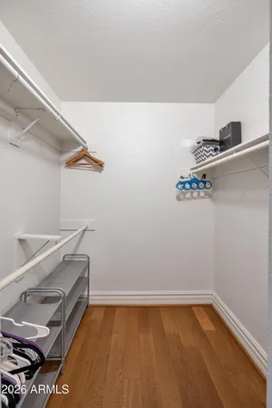 a kitchen that has a lot of cabinets in it and appliances