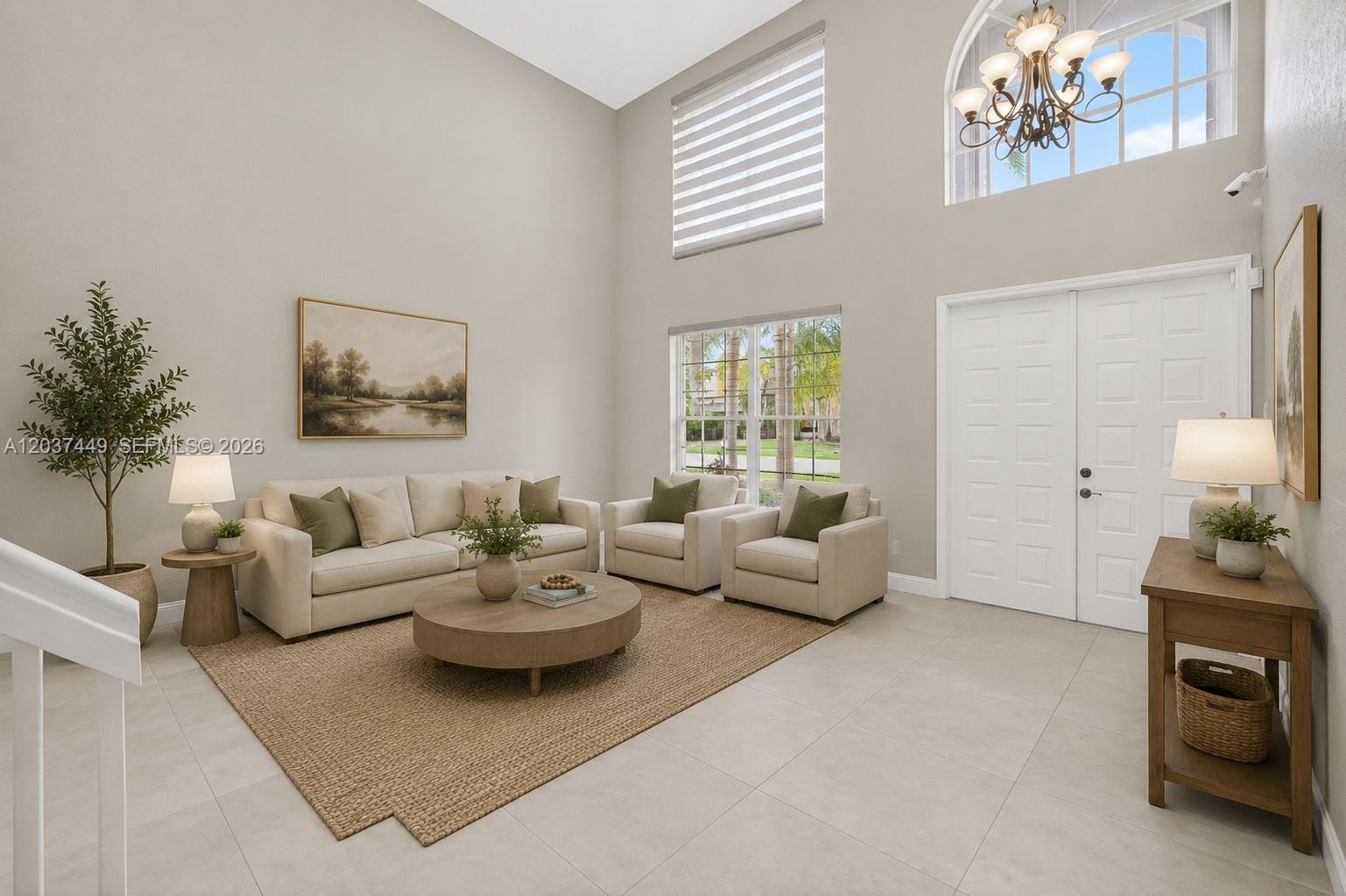 17488 Southwest 28th Court Miramar, FL 33029 - Photo 3 of 50 a living room with furniture and a large window