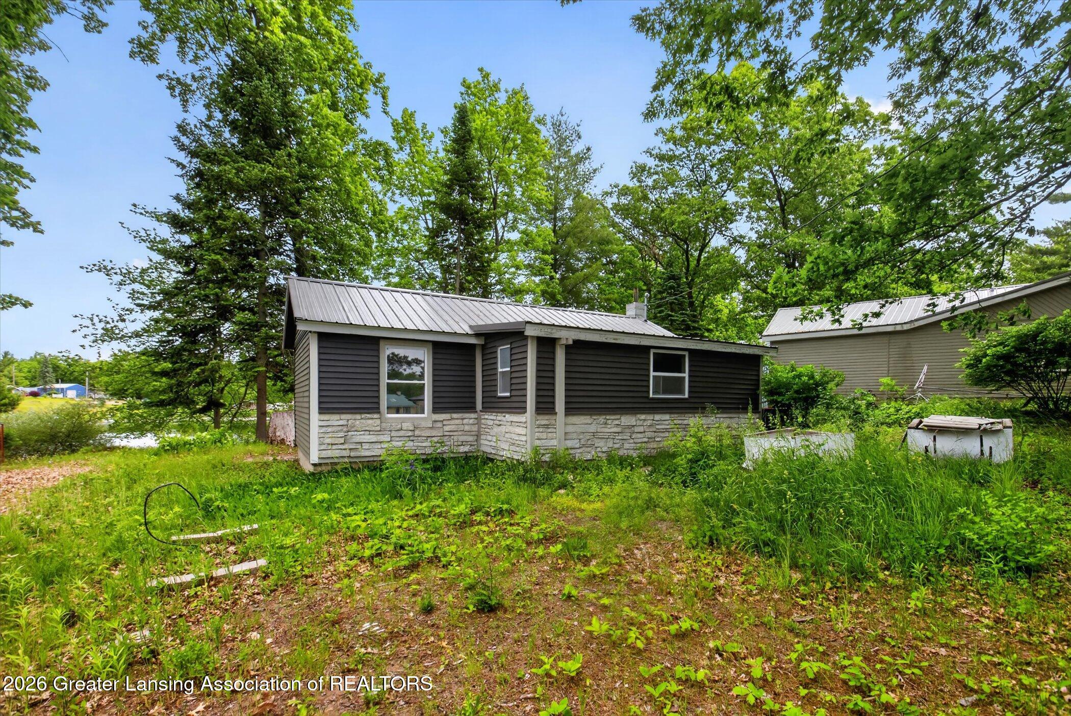 6919 South Ruby Street Harrison, MI 48625 - Photo 1 of 24 02-6919-S-Ruby-St