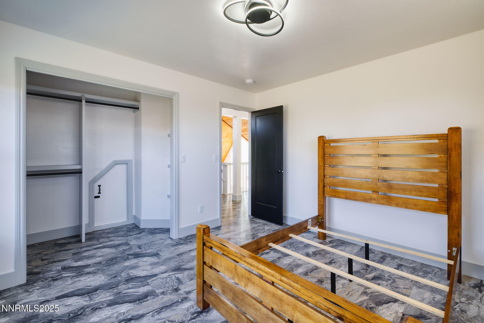 2988 Pine Valley Road Gardnerville, NV 89410 - Photo 11 of 21 a bedroom with a bed and cabinets