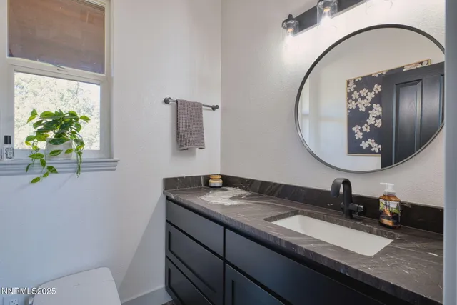 a view of a garage with storage and utility