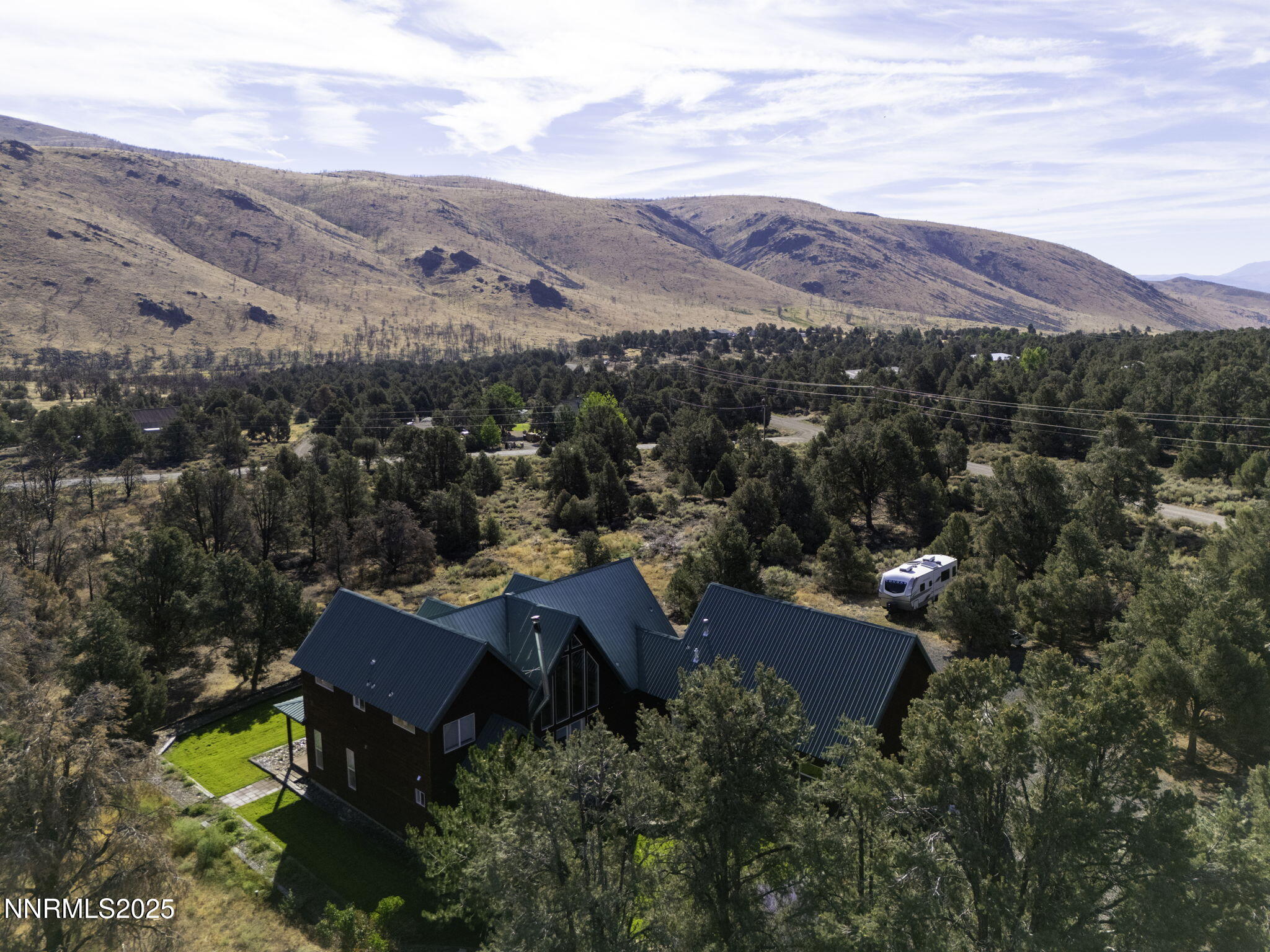 2988 Pine Valley Road Gardnerville, NV 89410 - Photo 20 of 21 a view of a house with a mountain in the background