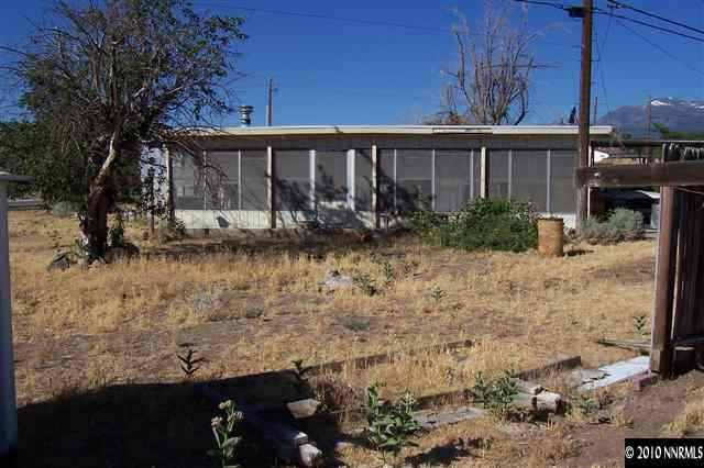 375 Zolezzi Lane Reno, NV 89511 - Photo 2 of 9 a view of a house with a yard