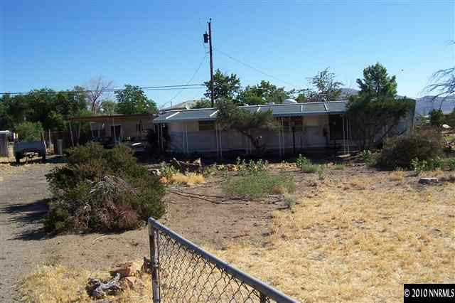 375 Zolezzi Lane Reno, NV 89511 - Photo 3 of 9 a view of wooden fence and plants