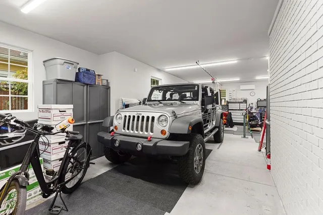 a bedroom with furniture and a window