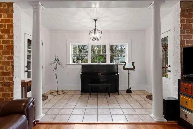 a living room with a couch and a table in it