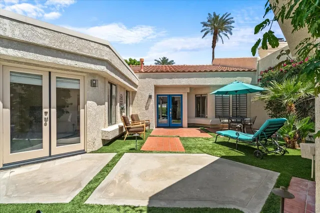 a view of a house with a patio