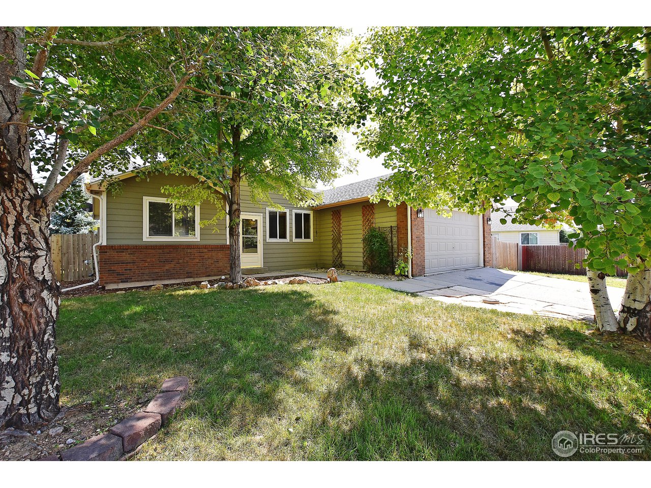 622 East 4th St Road Eaton, CO 80615 - Photo 1 of 40 Wooded front yard of 622 E 4th St Rd