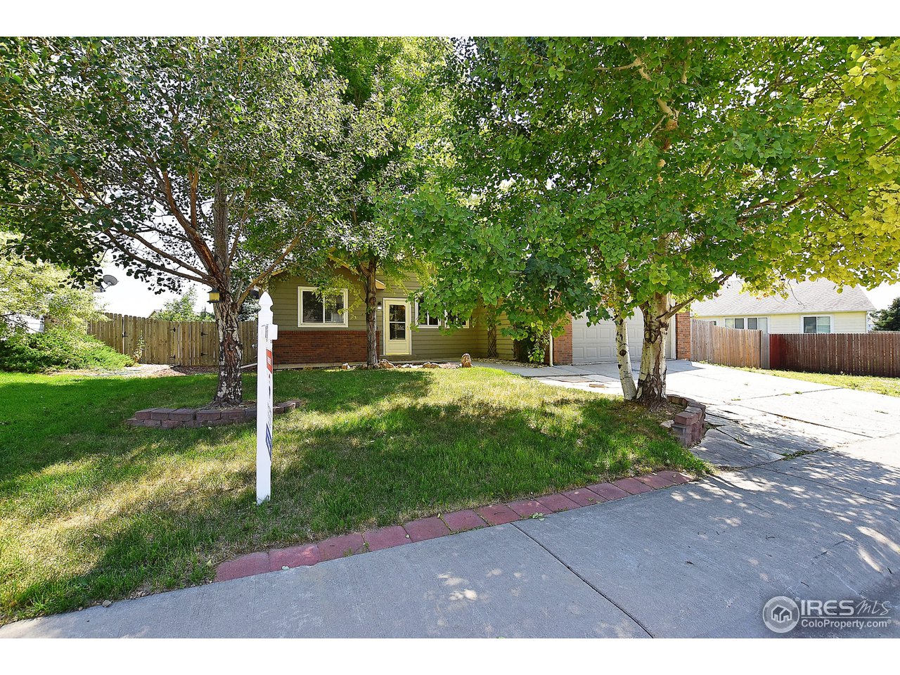 622 East 4th St Road Eaton, CO 80615 - Photo 2 of 40 Aspen shaded front view of Home