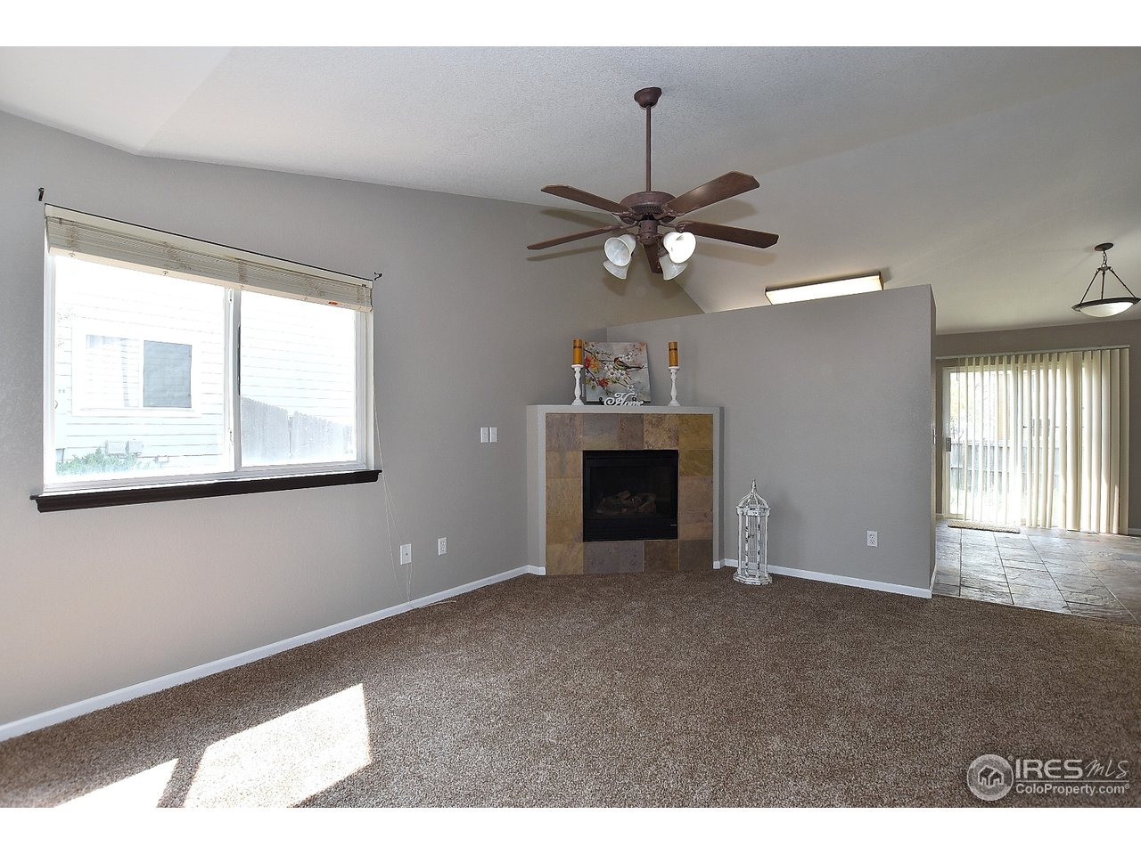 622 East 4th St Road Eaton, CO 80615 - Photo 5 of 40 Living Room with Fireplace