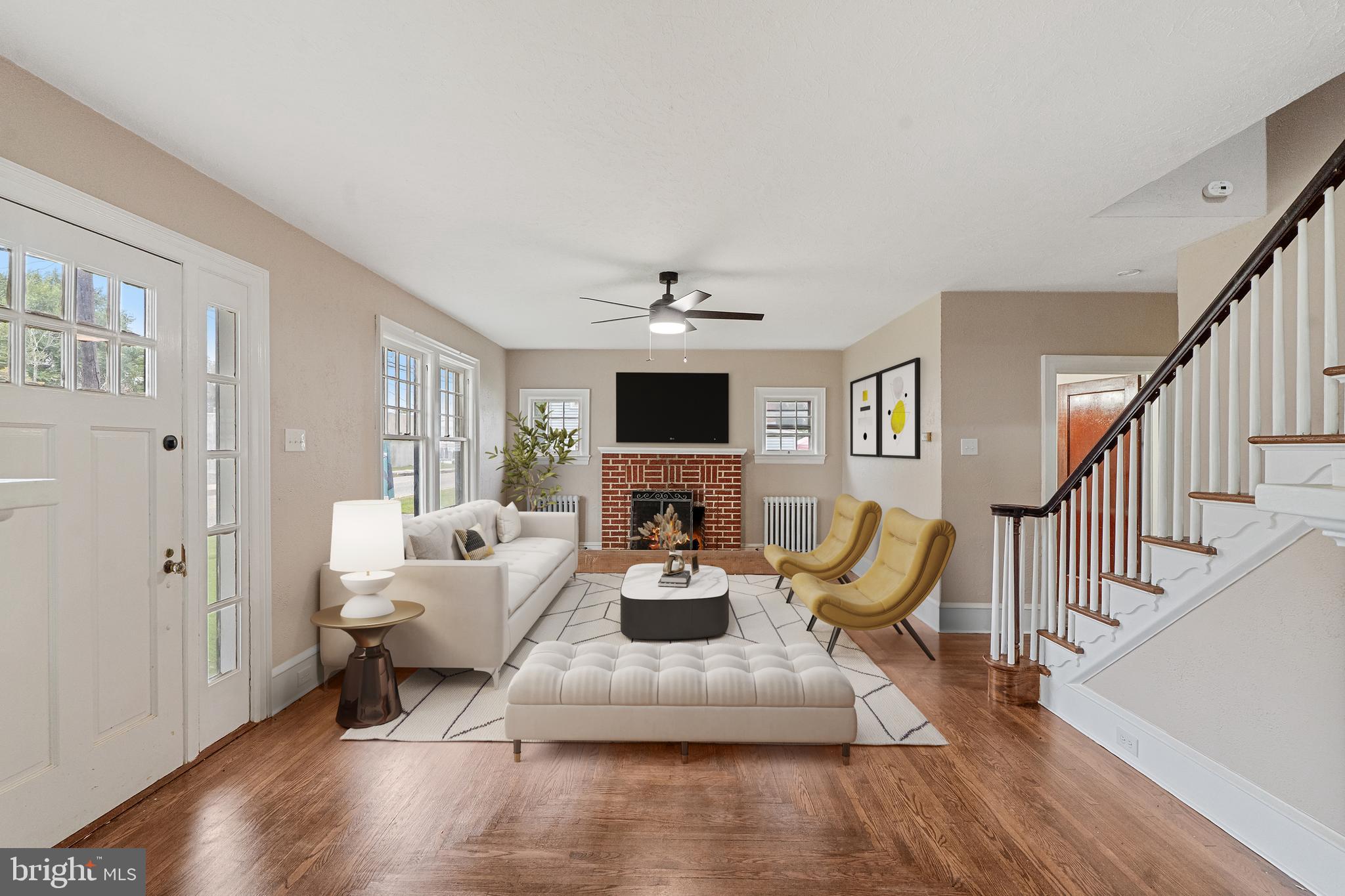 414 Main Street Dorchester, NJ 08316 - Photo 2 of 22 a living room with furniture and a fireplace