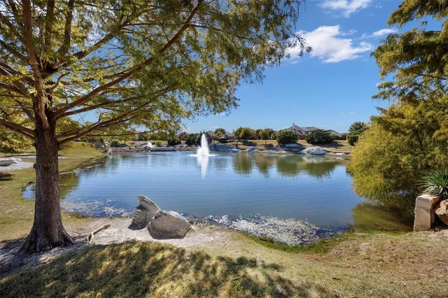 a view of a lake from a yard