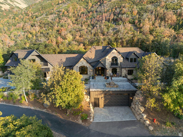1141 South Oak Leaf Lane Springville, UT 84663 - Photo 126 of 147 Stone and timber-clad residence with multiple gables and a prominent arched entryway