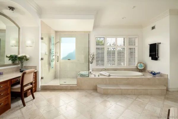 an aerial view of a house with yard