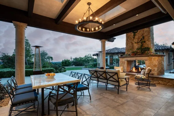 a kitchen with stainless steel appliances granite countertop a sink and a refrigerator