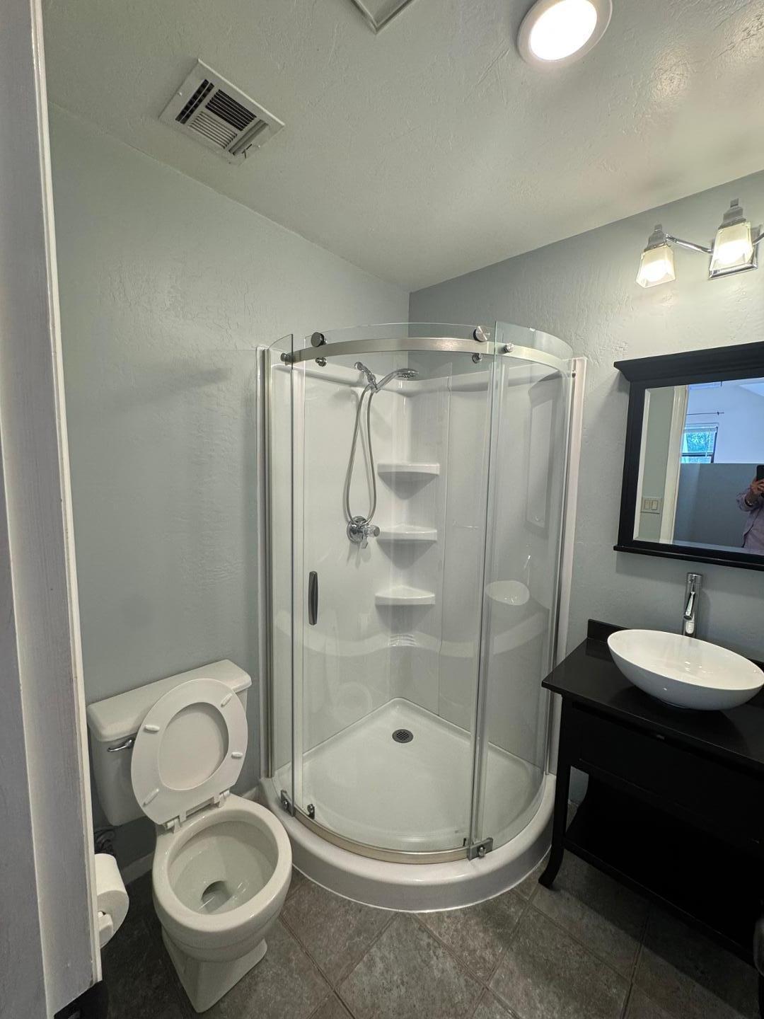 326 West Granada Road Phoenix, AZ 85003 - Photo 28 of 37 a bathroom with a toilet and a shower