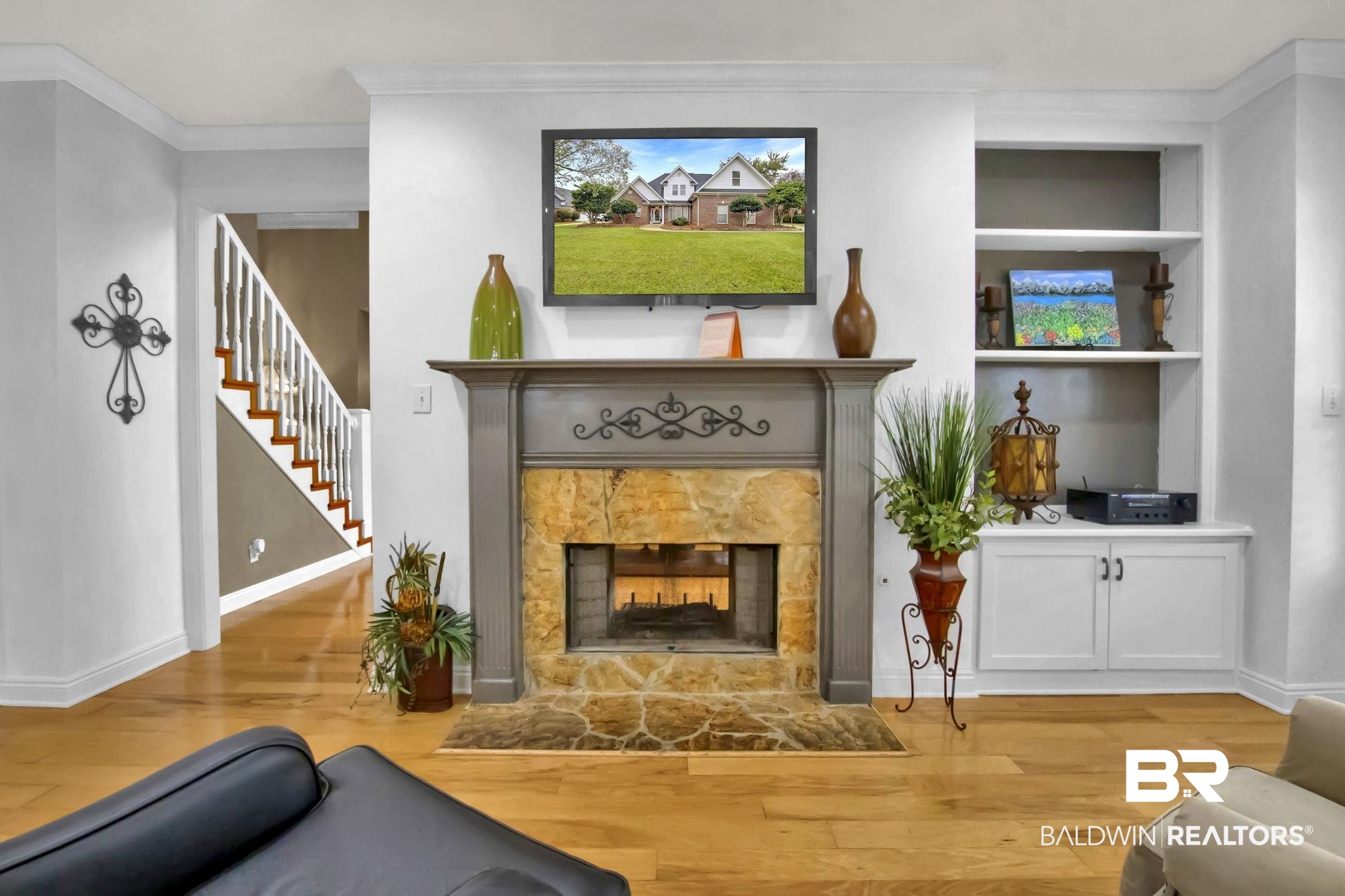 9002 Parliament Circle Daphne, AL 36526 - Photo 19 of 73 Sitting/reading area with hardwood floors, double sided fireplace, and crown molding