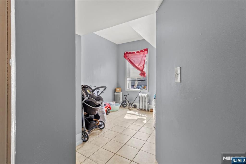 331 Market Street Paterson, NJ 07501 - Photo 24 of 25 a room with storage and utility