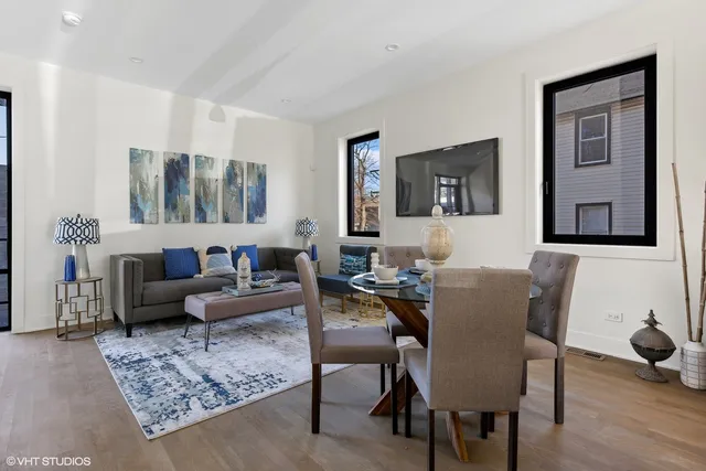 a living room with furniture or couch and a flat screen tv