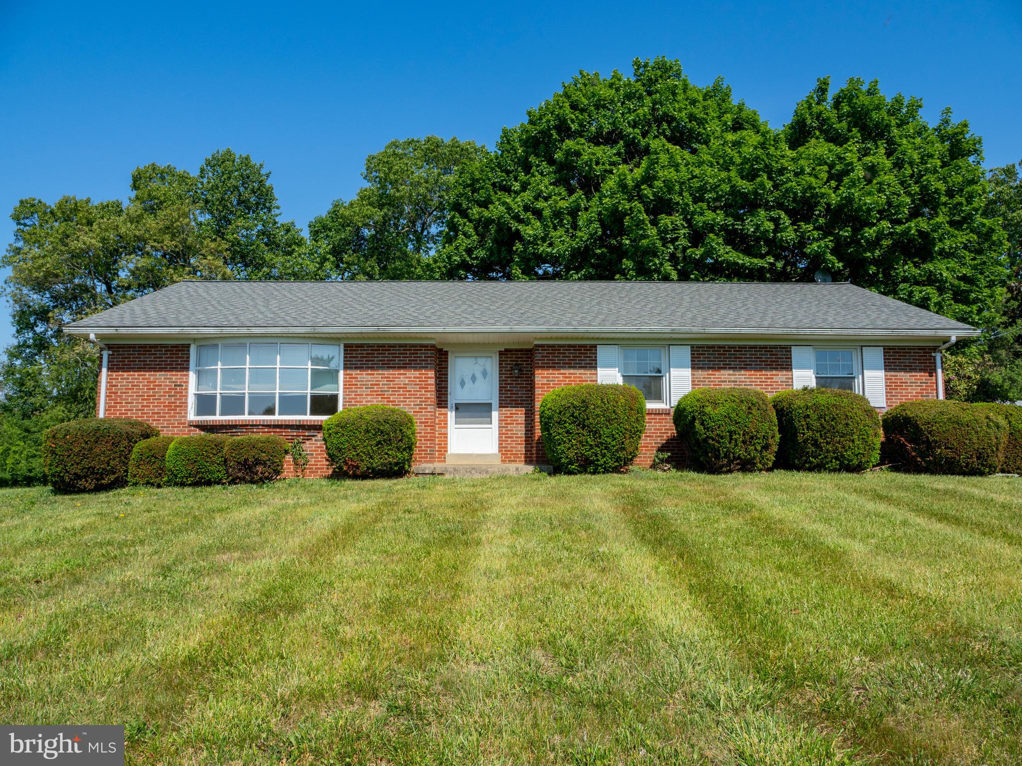 26906 Clarksburg Road Damascus, MD 20872 - Photo 1 of 17 a view of a house with backyard and trees