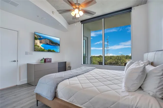 a bathroom with a toilet sink and shower