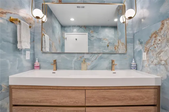 a view of a workspace with furniture and gym equipment