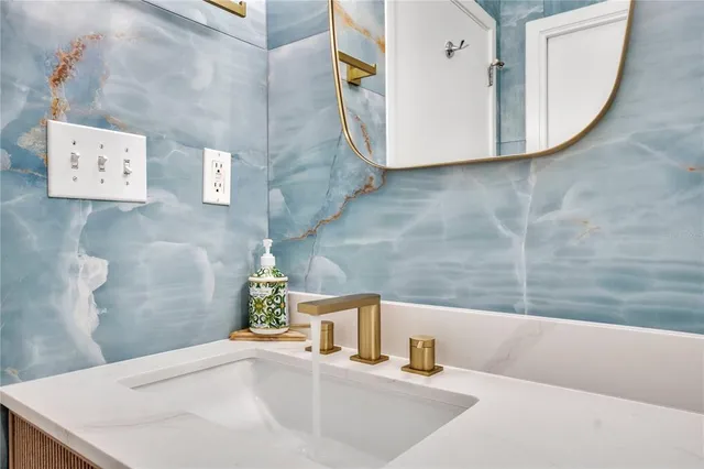 a living room that has a couch and a table in it