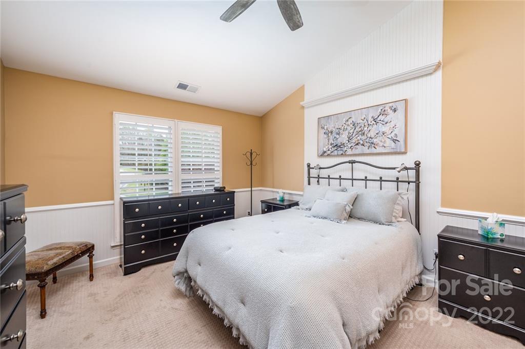 3541 Vandora Springs Road Fort Mill, SC 29708 - Photo 15 of 40 a bedroom with a bed and furniture