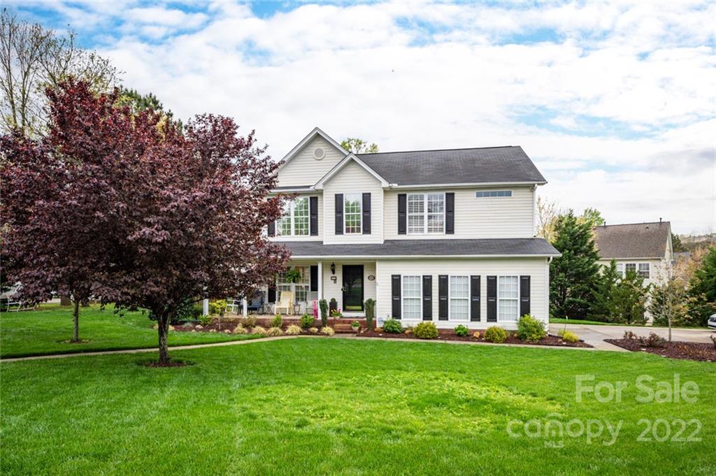 3541 Vandora Springs Road Fort Mill, SC 29708 - Photo 2 of 40 a front view of a house with a garden
