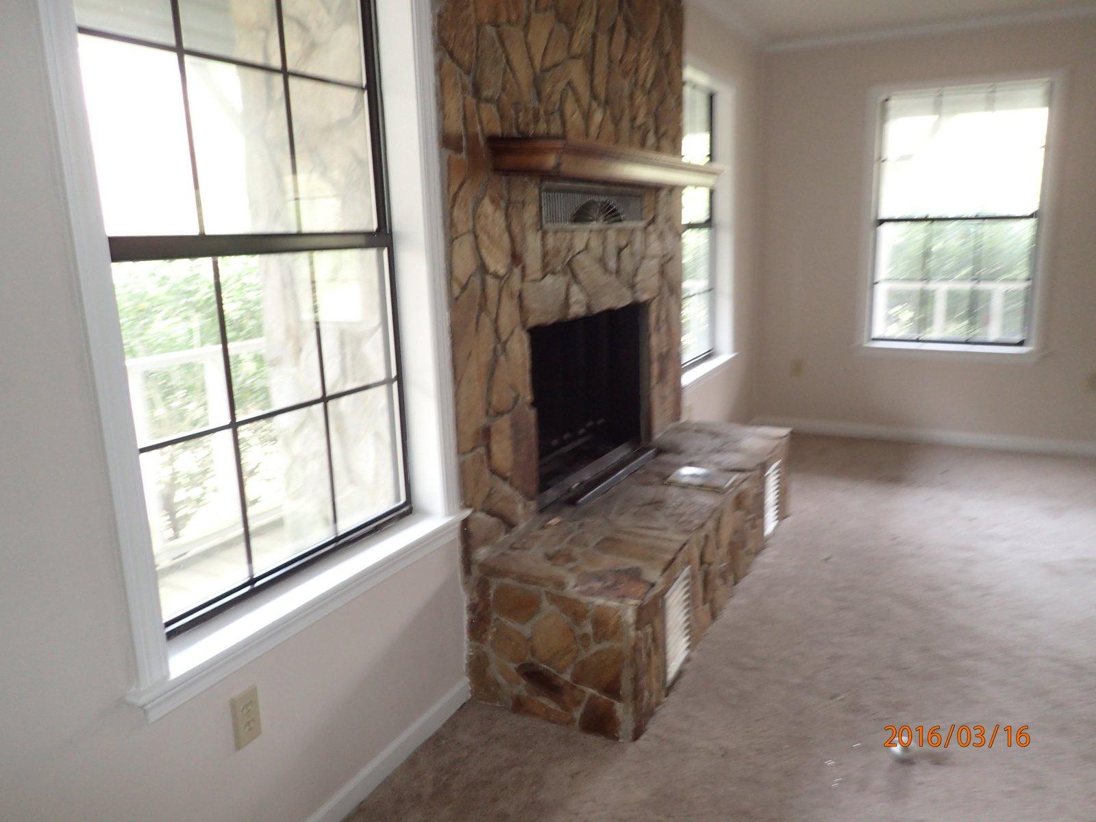 5864 Ward''s Ranch Road Crestview, FL 32536 - Photo 3 of 16 a living room with furniture and a fireplace