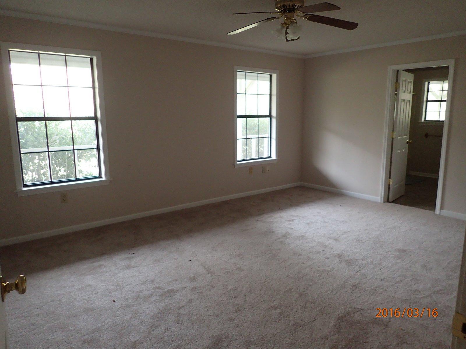 5864 Ward''s Ranch Road Crestview, FL 32536 - Photo 9 of 16 an empty room with a window