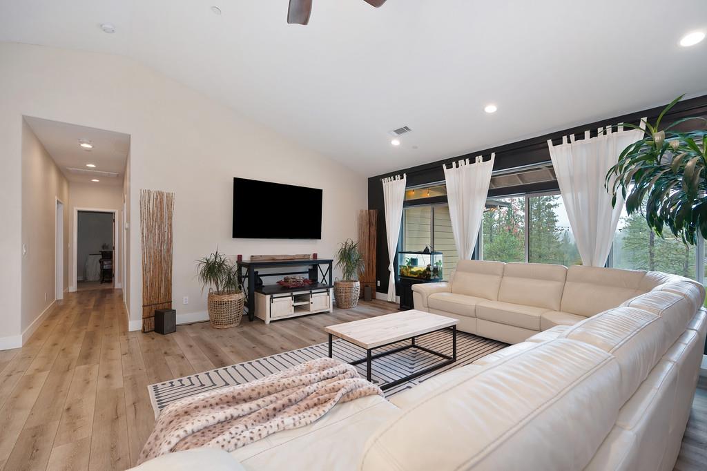 3960 Fort Jim Road Placerville, CA 95667 - Photo 11 of 64 a living room with furniture and a flat screen tv