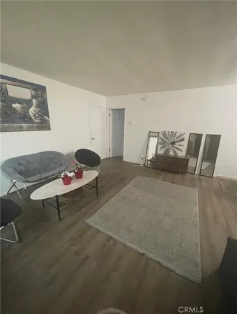 a bedroom with a bed and dresser