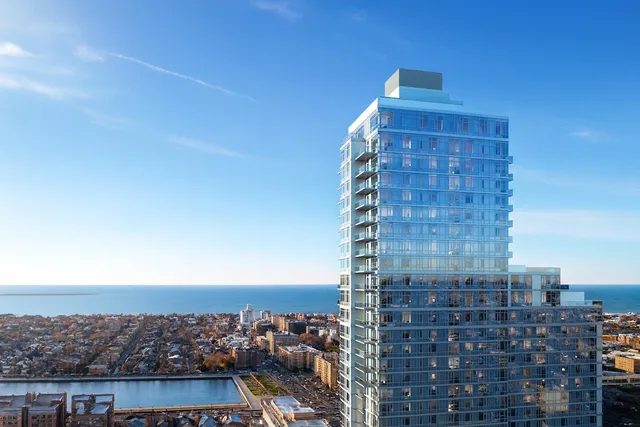 a kitchen with lots of clutter and cabinets