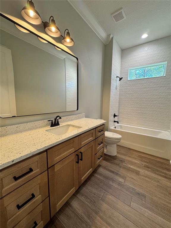 18354 Southwest 65th Loop Dunnellon, FL 34432 - Photo 31 of 35 a bathroom with a double vanity sink and a toilet