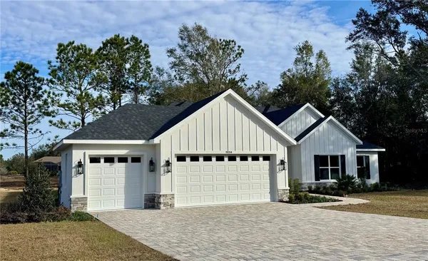 front view of a house with a patio