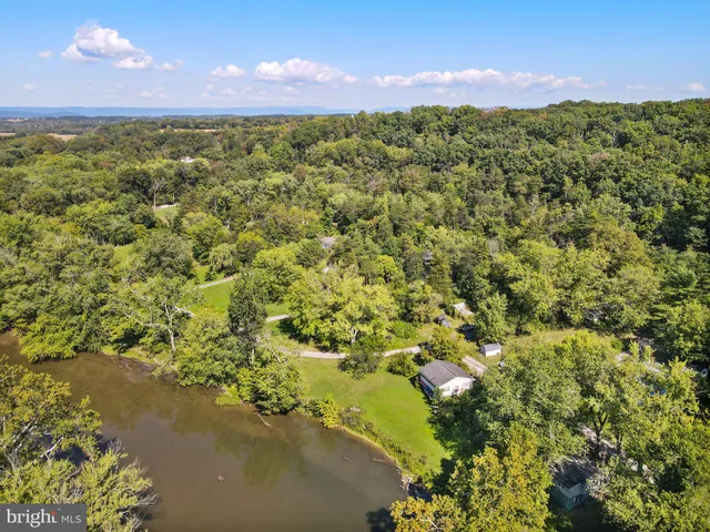 a view of a city with mountains in the background