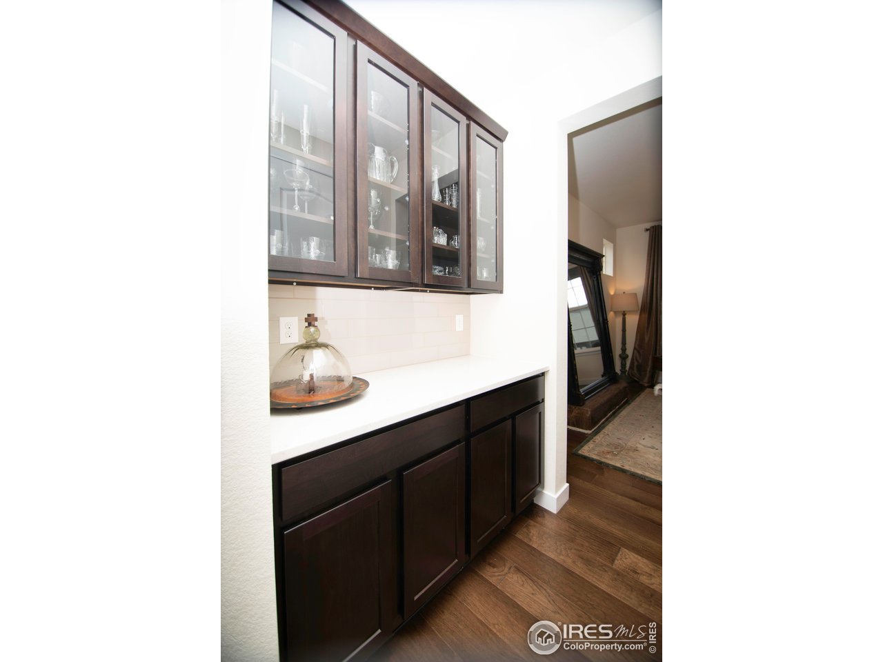 7086 Thunderview Drive Timnath, CO 80547 - Photo 15 of 38 a en suite bathroom with a sink and a mirror