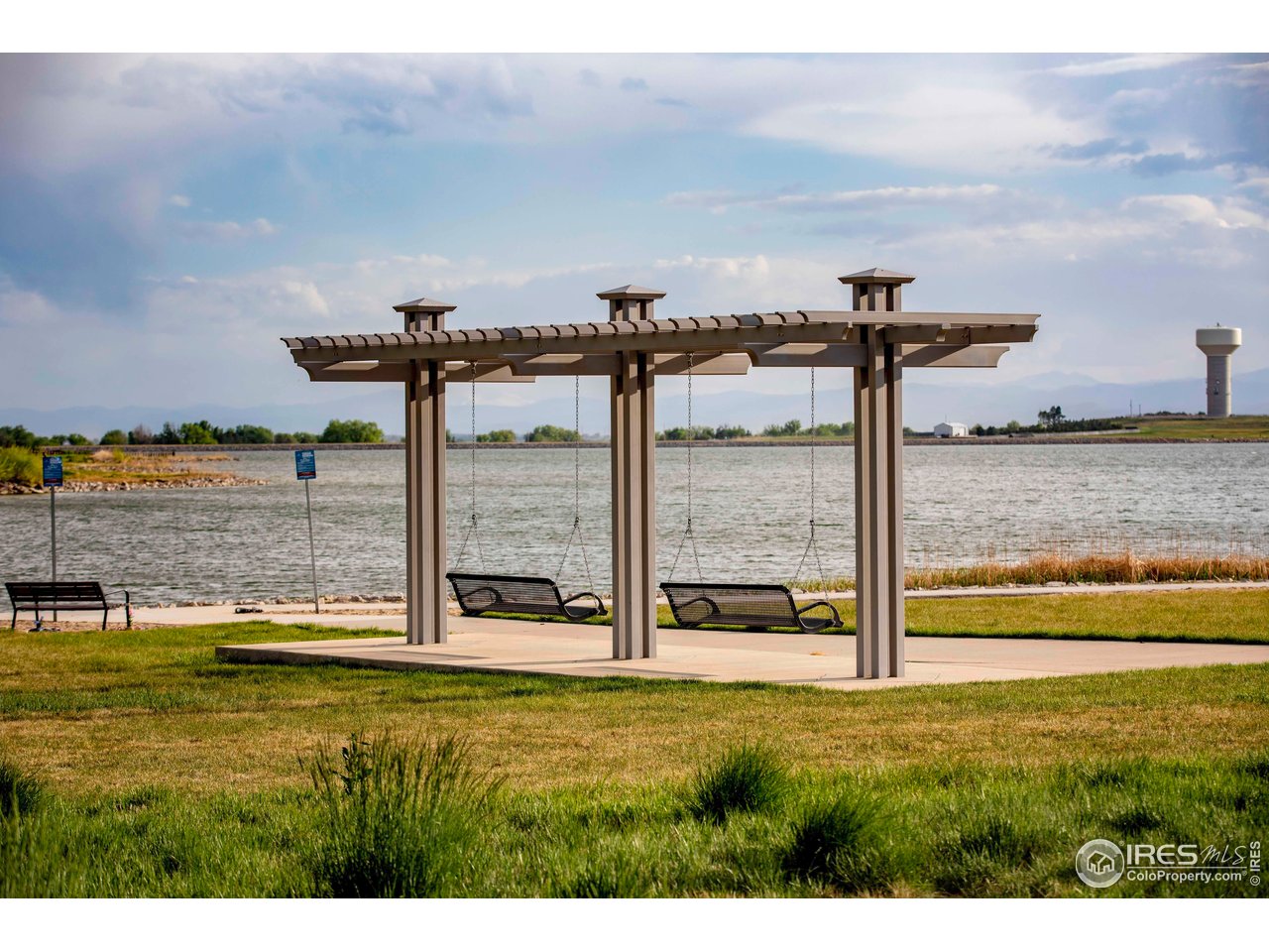 7086 Thunderview Drive Timnath, CO 80547 - Photo 35 of 38 a view of a swimming pool and an ocean view