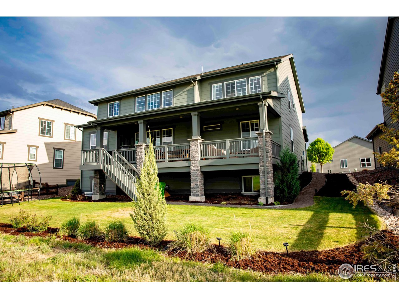 7086 Thunderview Drive Timnath, CO 80547 - Photo 5 of 38 a view of an house with swimming pool