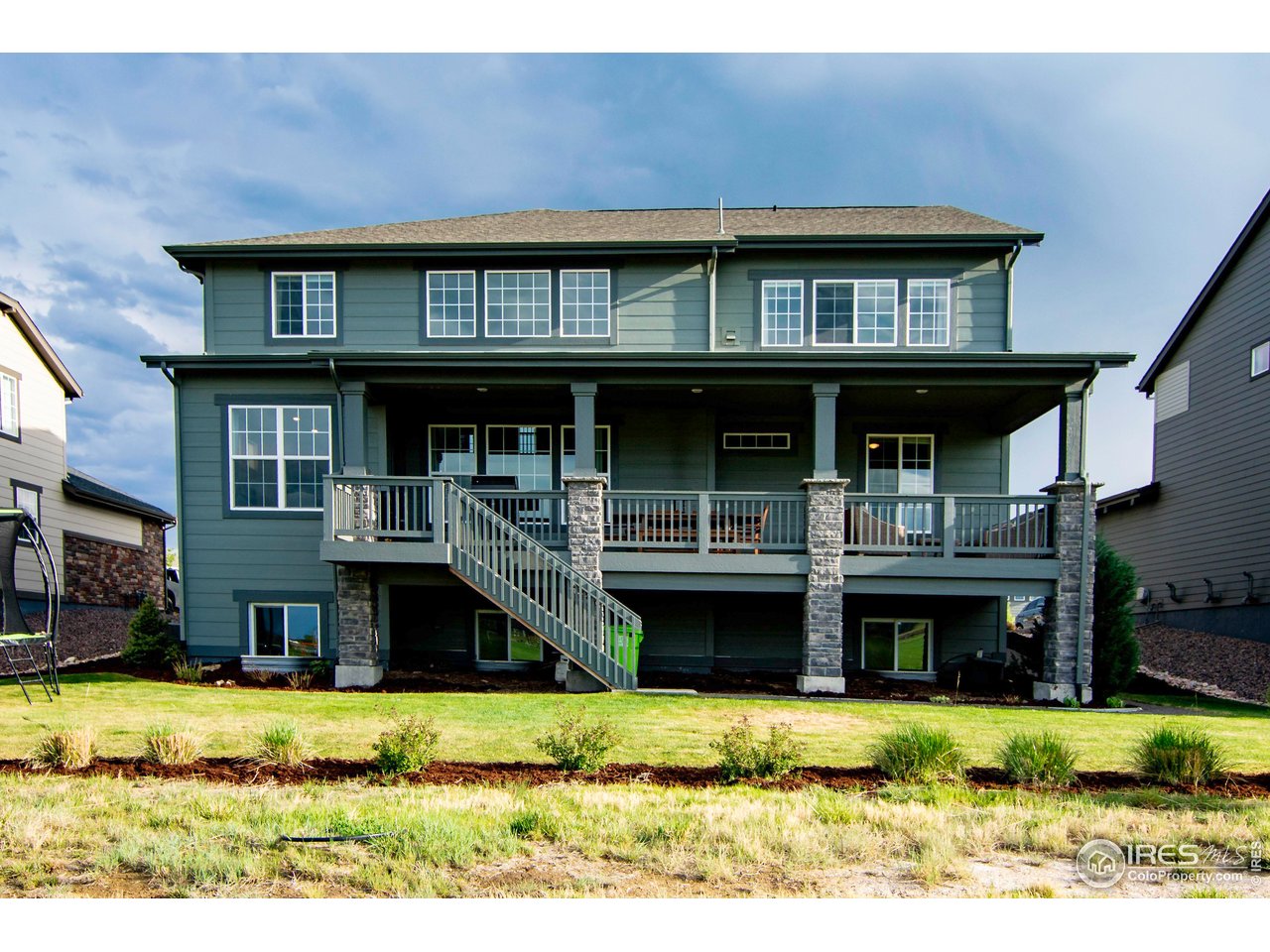 7086 Thunderview Drive Timnath, CO 80547 - Photo 6 of 38 a view of house with outdoor space