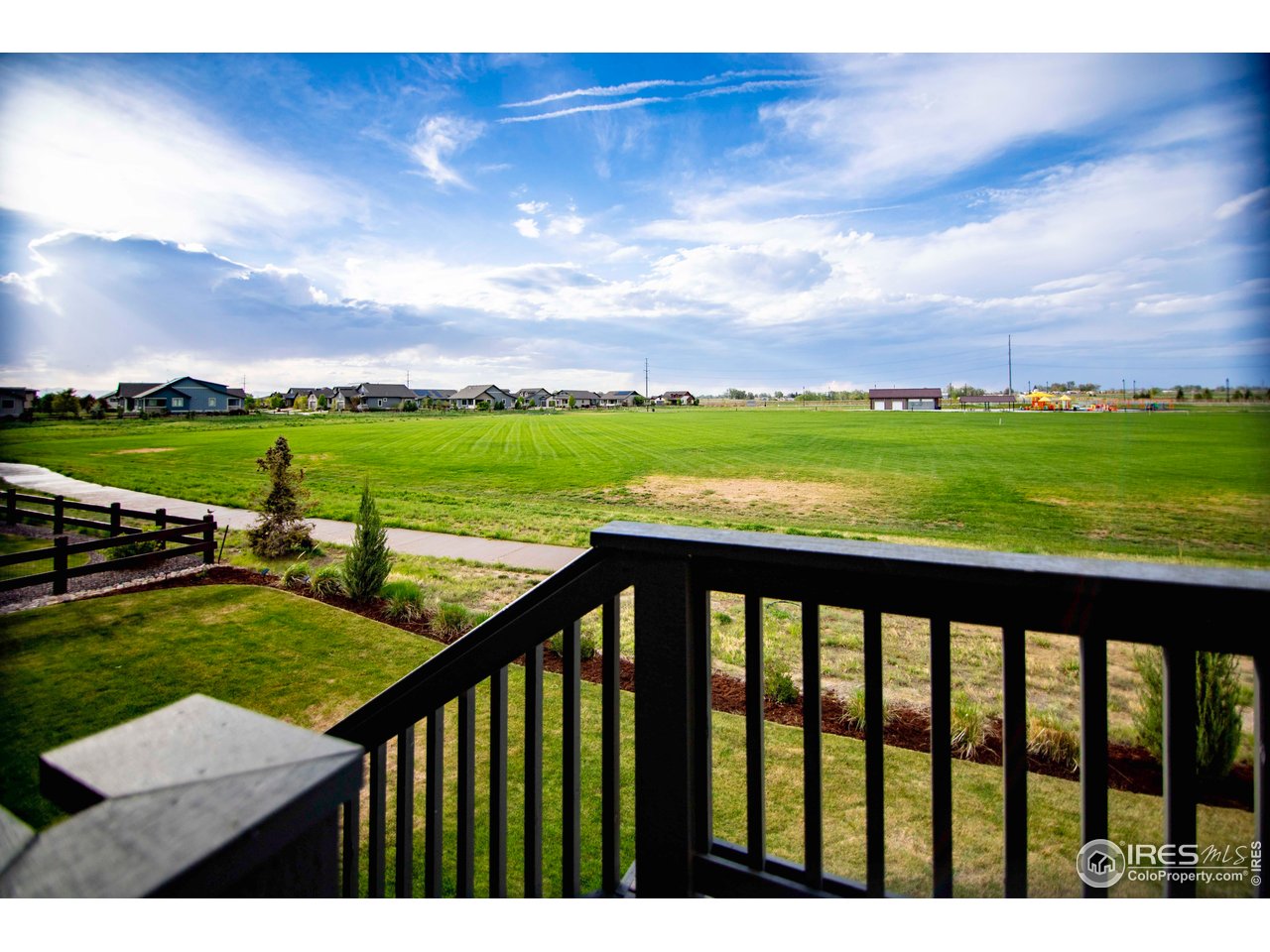 7086 Thunderview Drive Timnath, CO 80547 - Photo 8 of 38 a view of yard from a balcony