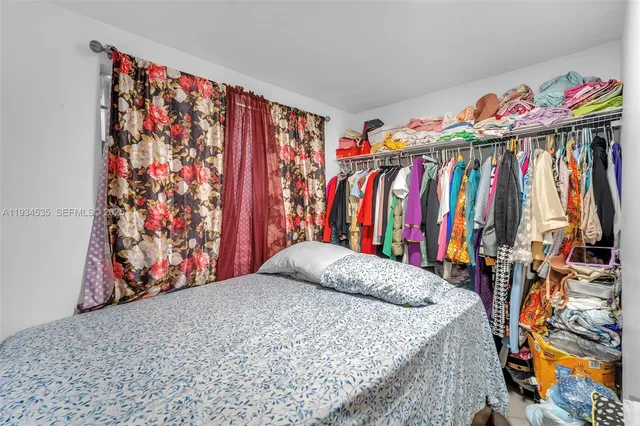 a view of a closet with storage