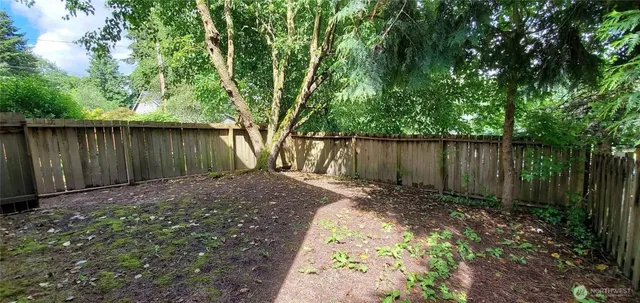 a view of backyard with green space