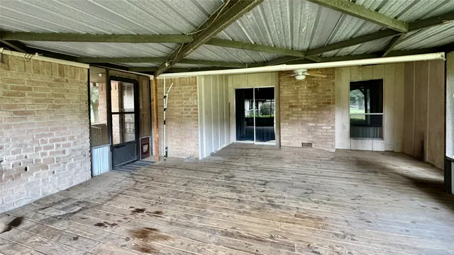 a view of outdoor space with garden and trees